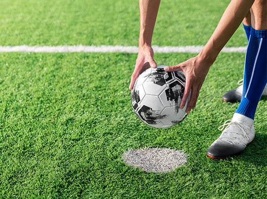 Ballon de foot dans le rond central